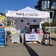 a tent with lots of items for sale