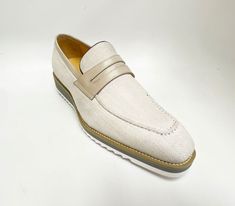 Style: 515-42F-Cream Unique Woven Canvas slip-on Penny Loafer from our Carrucci by Maurice collection features a Calfskin Strap, full Leather Lining, a clean welt and Tricolored Lightweight Rubber Sole! Formal Beige Slip-ons For Spring, White Almond Toe Slip-ons For Business, Beige Slip-on Business Moccasins, Classic Beige Slip-ons For Office, Formal Beige Slip-ons With Leather Sole, Classic Cream Slip-on Moccasins, Beige Slip-ons For Office In Spring, Beige Office Slip-ons For Spring, White Moccasins For Business In Spring