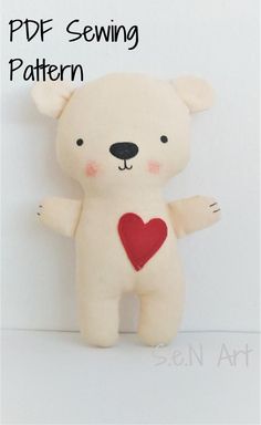 a white teddy bear with a red heart on it's chest and the words pdf sewing pattern above it