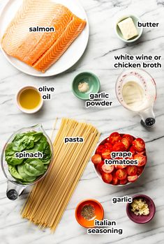 ingredients to make salmon pasta laid out on a marble table