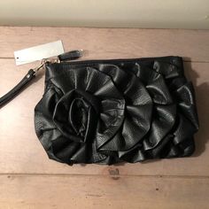 Giannini Faux Leather Purse With Ruffled Flower Like Design. Item Is New With Tags. Multiple Pockets On The Inside And Zips Closed. There Is A Small Trace Of Gold On The Back, Likely A Manufacturing Error But Is Very Small And Unnoticeable. Check Out Bundles With Other Heavily Discounted Or Used Items! Black Clutch Bag For Spring, Black Bag For Night Out In Spring, Chanel Clutch Bag, Chanel Clutch, Clutch Purse Black, Metallic Clutch, Black Leather Clutch, Authentic Bags, Rhinestone Clutch