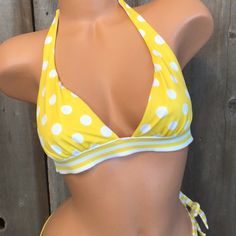 Nwot, Never Worn No Flaws Victoria’s Secret Bikini Top 2012 Line Color: Yellow White Dot Size: Small Halter Style, Ties At Neck Allover Dot Print, Contrasting Stripe Band Back Tie Closure Place For Pads, Does Not Include Them. Color Is More Of A Yellow/Orange Elastic Checked And In Perfect Condition (Doesn’t Sit Flat On Mannequin As She Is The Wrong Size/Shape) Listing Is For Top Only Matching Bottoms Available In Separate Listing And Are Size Small Tags: Spring Break Summer Vacation Bikini Swim Retro Fitted Polka Dot Swimwear, Polka Dot Swimwear For Spring And Summer, Fitted Polka Dot Swimwear For Spring, Fitted Yellow Swimwear For The Beach, Fitted Yellow Swimwear For Beach Season, Yellow Fitted Triangle Top Swimwear, Victoria's Secret Yellow Beachwear, Victoria's Secret Yellow Swimwear For Vacation, Victoria's Secret Yellow Beachwear Swimwear