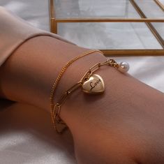 "Adorn yourself or your bridesmaids with our Personalized Mother of Pearl Bracelet. With a heart charm and minimalist design, it's a heartfelt and stylish jewelry gift. Embrace elegance and sentimentality with our customizable bracelet. #YOU MAY LIKE THIS Dainty rose gold slider bracelet https://www.etsy.com/listing/1486513550/dainty-rose-gold-slider-bracelet Engraved Paperclip Silver Heart Bracelet https://www.etsy.com/listing/1497885357/engraved-paperclip-silver-heart-bracelet # HOW TO ORDER 1 Minimalist Bridesmaid, Bridesmaid Jewelry Gift, Shiny Bracelets, Mother Of Pearl Bracelet, Pearl Charm Bracelet, Gold Pearl Bracelet, Pearl Bracelet Gold, Dainty Rose, Engraved Bar Necklace