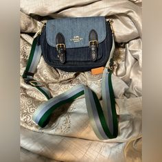 Beautiful Rare Denim Crossbody. Straps Are Green And Baby Blue. Excellent Condition. Worn Twice. Denim Blue Cotton Crossbody Shoulder Bag, Denim Blue Crossbody Shoulder Bag With Adjustable Strap, Coach Blue Bag With Adjustable Strap, Vintage Denim Blue Shoulder Bag, Green Coach Bags With Silver-tone Hardware, Denim Crossbody, Mint Color, Coach Bags, Blue Light