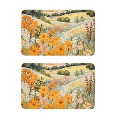 two placemats with yellow flowers and trees in the background, one has an image of