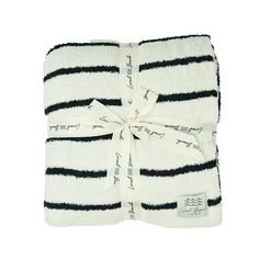 the black and white striped towel is tied up