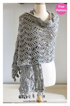 a crocheted shawl is shown on a mannequin head with the text, free pattern