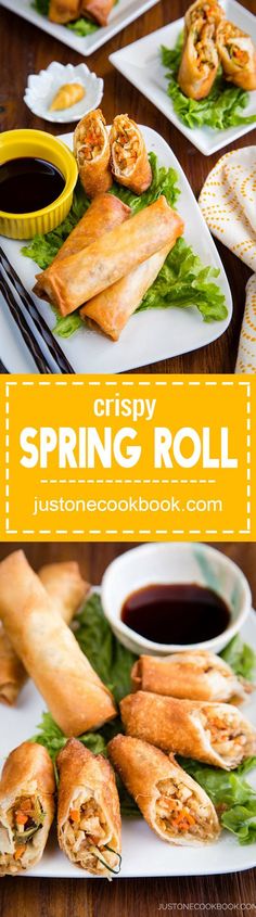 crispy spring roll with dipping sauce on the side and other appetizers around it