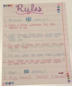 a handwritten rules written on a piece of paper with hearts around the writing area