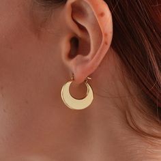 14 Carat Gold Crescent Model Earrings 14 Carat (585) Gold Weight: 2,25 gr. Color: Yellow. The size of the earring is average 2 cm. A great piece to add to every outfit! chains that you can combine with your clothes with the elegance of İpek Silver! * Product Detail Product Content: 14k Gold All our products are sent with İPEK SİLVER Guarantee. Since our products are handcrafted, there may be + - 5% deviation in mine weights. The product are sent with a gift box, package and a gift note of your choice. Your products are sent with the gift box, package and note of your, with the İpek Silver guarantee. *I will put your jewelry in a nice and secure package in order to make sure that it will be delivered to your address safely. This is definitely the perfect gift for him or her. *JEWELERY GIFTS Gold Hoop Jewelry With Moon Phase Detail, Elegant Gold Half Moon Hoop Earrings, Elegant Half Moon Gold Hoop Earrings, Moon Charm Hoop Earrings In Celestial Style, Moon Charm Huggie Earrings, Gold Minimalist Hoop Earrings With Moon Charm, Gold Huggie Earrings With Moon Charm, Elegant Crescent Hoop Earrings With Moon Charm, Celestial Style Hoop Earrings For Everyday Wear