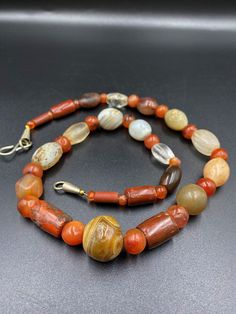 A beautiful old Ancient Antique Himalayan Indo Tibetan Necklace mala of carnelian Agate Sualamani , crystals beads The age of this beads are more than 1000 years old They were used in ancient times in prayers mala and in jewelry They were used as trade beads as well we provide fast and free shipping service world wide Antique Gemstone Beaded Necklace, Antique Gemstone Necklace With Round Beads, Antique Carnelian Necklace With Natural Stones, Antique Carnelian Necklaces With Natural Stones, Antique Agate Beads, Traditional Agate Gemstone Necklace, Antique Agate Gemstone Beads Necklace, Antique Agate Beads For Gifts, Traditional Agate Gemstone Beaded Necklaces