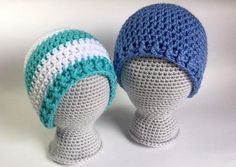 two crocheted hats sitting on top of each other