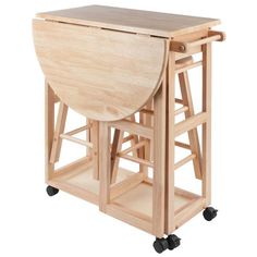 a wooden table with wheels on it and a cutting board attached to the back end