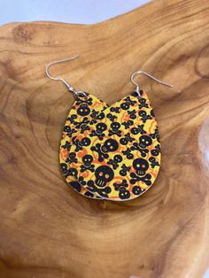 Halloween Yellow Orange Black Skeleton Earrings Made in The USA Cheap Yellow Jewelry For Halloween, Cheap Spooky Orange Earrings, Cheap Orange Spooky Earrings, Black Skeleton, Skeleton Earrings, Yellow Orange, Made In The Usa, Orange Black, Skeleton