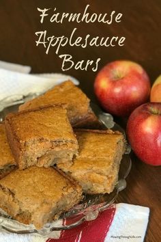 apples and brownies on a table with the words farmhouse apple sauce bars in front of them