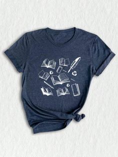 This stylish book lover shirt is the perfect gift for avid readers and educators alike, featuring trendy designs that celebrate a passion for literature. Crafted with high-quality materials, it offers both comfort and durability, making it ideal for everyday wear or special occasions. The shirt showcases unique bookish art, appealing to those who appreciate dark academia aesthetics and the joy of reading. Whether for a teacher, a bookworm, or as a thoughtful present for a friend, this custom shi Dark Academia Aesthetics, Dark Academia Shirt, Halloween Letras, Bookish Art, Minimalist Book, Bookworm Shirt, Academia Aesthetics, Bookish Gifts, Trendy Shirts