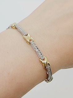 Two Tone Diamond Bracelet 14K White Gold Beautiful Gift for your loved one Total Diamonds approximately 0.73 CT Total weigh 11.75 g Item will be placed into a gift box Two Tone Bracelet, Mixed Metals, Diamond Bracelet, Two Tone, Special Occasion, Gift Box, Beaded Bracelets, Diamonds, White Gold