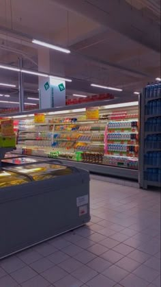 an empty grocery store filled with lots of food