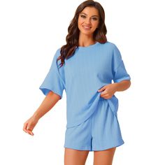 Elevate your lounging experience with the Cheibear Women's Lounge Outfits. This pajama set combines style and comfort with its casual round neck, short sleeves, and matching shorts, all crafted in a ribbed, solid blue color. Perfect for a range of activities from sleeping to relaxing around the house, this set ensures you stay comfortable and stylish.

- Material: 95% Polyester, 5% Spandex
- Color: Blue
- Gender: Female
- Size: Medium
- Features: Breathable, moisture-wicking, skin-friendly fabri Comfortable Blue Lounging Set, Solid Crew Neck Sets For Loungewear, Cozy Blue Loungewear Set, Casual Ribbed Sets For Loungewear, Comfy Blue Sleepwear For Lounging, Solid Ribbed Loungewear Set, Cozy Sleepwear For Loungewear, Blue Crew Neck Pajama Set For Pajama Party, Cotton Pajama Shorts For Pajama Party