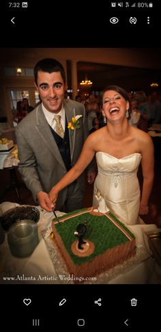 a bride and groom cutting their wedding cake