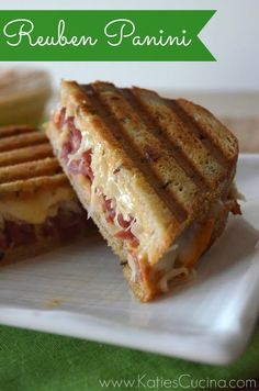 a grilled cheese and ham sandwich with waffles on a white paper plate