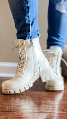 FINAL SALE These ivory patent combat boots from Corkys are giving me 90s vibes all over again! I adore the combat boot with dresses and skirts look but these can be paired with jeans and shorts too! And you can jazz them up with some fun colorful shoelaces to really make them pop! Featuring a lug sole and a cushioned insole. These lace up but also have a zipper on the inside for easy on and off. 2.25" heel with 1" platform These fit true to size but only come in whole sizes so you if you're usua White Chunky Combat Boots, Combat Boots With Dress, Beige Lace-up Combat Boots For Spring, Ivory Combat Boots, Spring White Lace-up Combat Boots, Beige Lace-up Combat Boots For Winter, Boots With Dresses, Heel Combat Boots, Combat Boot Outfit