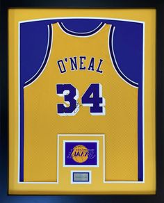 a framed jersey with the number 34 on it