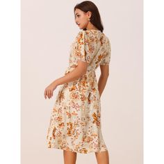 This floral casual dress will flatter any body shape, making it a timeless addition to any wardrobe. Occasion: It's Matched Well With Your Heels, Boots, Flats, and Slippers For Casual, Work, Beach, Dinner, Party, Daily, Honeymoon, Holiday, and Vocation. Easily pair it with your sandals, heels, and summer accessories. Sweet as well elegant. The floral print of this flowy sundress can perfectly express your personality and chic. Cream A-line Midi Dress With Floral Print, Knee-length Midi Dress With Fitted Waist For Garden Party, Fitted Waist Knee-length Midi Dress For Garden Party, Beige Fitted Waist Dress For Spring, A-line Cream Midi Dress With Floral Print, Knee-length Floral Midi Dress With Fitted Waist, Daywear Dress With Floral Print And Fitted Waist, Beige Floral Print V-neck Midi Dress, Beige Floral Print Dress For Daywear