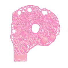 an image of a pink object with bubbles on the top and bottom part of it