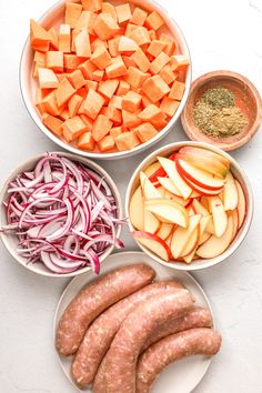 four bowls filled with different types of food on top of a white countertop next to each other