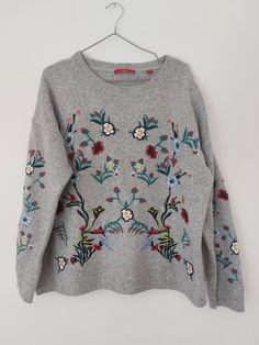 Vintage  Embroidered Sweater, Unique Knitwear, Floral Pullover, 80s Grandma Grey Sweater, Blouse, Women's Unique Knit Size XL Acrylic 100% Acrylic s.Oliver Size  44/XL but see measurements  All measurements taken with garment laid flat: Bust 63cm / 24,80 in x2 Lenght 63cm / 24,80 in Shoulders 71cm /27,95 in Sleeve lenght 45cm / 17,71 in Condition used good Cozy Long Sleeve Sweater With Floral Embroidery, Embroidered Crew Neck Knit Sweater, Casual Winter Sweater With Floral Embroidery, Cozy Winter Sweater With Floral Embroidery, Embroidered Crew Neck Winter Tops, Spring Crew Neck Sweater With Fair Isle Pattern, Fall Floral Embroidered Crew Neck Sweater, Spring Fair Isle Crew Neck Sweater, Embroidered Long Sleeve Knit Sweater