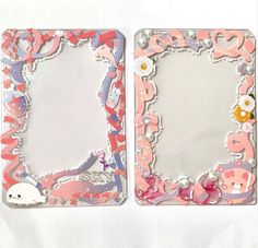 two pink and white photo frames sitting next to each other