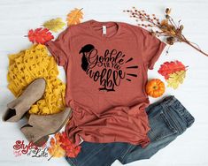 Gobble Til You Wobble T-shirt | Best and unique Fall unisex t-shirt for men & women. Our handmade casual pumpkin stylish shirt is the best for any occasions like Christmas and Helloween. This shirt specially made for the fall season. Take your fashion to the next level with this unique shirt. This shirt Printed on comfortable Bella Canvas unisex shirts. Shirts run big, for a fitted look order a size down. #fallshirts #shirtsforfall #pumpkintshirt #pumpkinshirt #unisexshirt #womensshirt Fall Shirts For Women, Happy Pumpkin Spice Season, Pumpkin Spice Shirt, Happy Pumpkin, Unique Fall, Pumpkin Spice Season, Autumn T Shirts, Ladies Shirt, Stylish Top