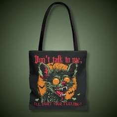 Unleash your inner creep with this hauntingly stylish tote bag from Royally Creepy Creations.💚 If you're a monster enthusiast, possess a dark sense of humor, enjoy the creepy cute aesthetic, or simply want to express yourself with a unique edge, we have something for you! Join us in embracing our weirdness because being normal is overrated and life's too short to wear boring clothes. Your wardrobe deserves a touch of creepy chic style, so treat yo'self! ☮️💚🧟 These tote bags are made with spun 100% polyester, these medium weight fabric bags feature double-stitched seams, cotton webbing straps, and nonwoven laminate lining for high-end durability and everyday use. Care Instructions: Remove all items from the bag before cleaning. Suggested to pretreat visible stains with stain remover. Mix Black Tote Shoulder Bag For Halloween, Black Emo Bag For Concerts, Black Emo Style Bag, Gothic Tote Bags For Halloween, Gothic Bags For Everyday Use And Halloween, Gothic Halloween Tote Bags, Gothic Halloween Bags For Alternative Fashion, Gothic Bags For Halloween Gift, Black Grunge Bag For Halloween