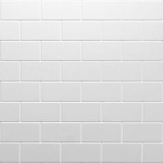 a white brick wall with no mortars or mortars on the bottom and one side