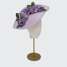 The lilac leaf disc with silk roses from the Rachel Trevor Morgan collection is suitable for all occasions such as weddings, garden parties, investitures and racing events. Meets Royal Enclosure size requirements. Set on a wire headband. Fits all head sizes. Fitted Lavender Mini Hat For Races, Lavender Fascinator Hat For Races, Luxury Purple Hats For Races, Blush Fascinator, Lilac Hat, Rachel Trevor Morgan Millinery, Rachel Trevor Morgan, Luxury Hat-shaped Fascinator For Garden Party, Headband Fits