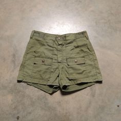 Vintage 70s olive green athletic/hiking shorts. Good vintage condition. Please see full measurements below.  Waist: 31" Inseam: 3" Outseam: 14" If you would like to see additional photos or have any other questions, please do not hesitate to ask, and thanks for looking! Shipping disclaimer: All domestic orders under 16oz ship USPS Ground Advantage. All domestic orders over 16oz ship USPS priority mail. All international orders under 4lbs ship via Etsy's Global Shipping Program. All international orders over 4lbs ship USPS priority mail. If international buyers wish to have a package that is under 4lbs shipped via priority mail, please contact me before purchasing so that I can adjust the shipping charges. Insurance can be added to any domestic or international order, please contact me befo Vintage Cargo Shorts, Olive Green Shorts, Hiking Shorts, Shorts Cargo, Green Shorts, Vintage 70s, Priority Mail, Cargo Shorts, Short Outfits