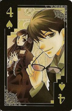 an ace playing card with two people in the background