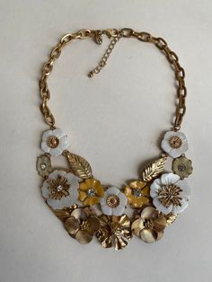 Vintage Charming Charlie Statement Gold & Silver Flower Statement Necklace Price includes shipping 18.5" White Necklaces With Flower Decoration For Spring, White Flower Necklace For Spring, Gold Flower-shaped Costume Jewelry Necklace, Spring Gold Necklaces With Flower Decoration, Gold Flower-shaped Costume Necklace, Spring Gold Necklace With Flower Charm, Gold Flower Costume Jewelry Necklace, Gold Necklace With Flower Charm For Spring, Gold Necklaces With Flower Decoration For Spring