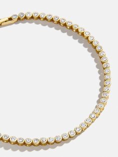 Our Amalie Tennis Bracelet makes for an easy addition to your already-curated wrist stack. This gold and crystal band features a lineup of beautiful bezel stones and stacks perfectly with other bracelet styles. Personalized Cuff Bracelets, Bracelet Styles, Wrist Stack, Eternity Bracelet, Wrist Stacks, 18k Gold Bracelet, 2024 Christmas, Birthday Wishlist, Tennis Bracelet