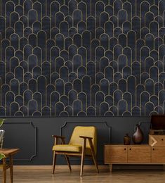 an art deco wallpaper with gold scallops on the dark blue background and wooden furniture