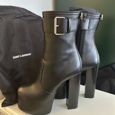 Truly Stunning Saint Laurent Platform Boots. Hit Mid-Calf With A 5.75” Stacked High Heel, 2.5” Wrapped Platform - Feels Like A 3.25” Heel. They’re Surprisingly Comfortable Thanks To The Stability Offered By How High It Goes. These Are Brand New, Never Worn And Come With The Saint Laurent Dust Bags (2). Fit True To Size. Size 36.5. Luxury Ankle Boots With 4-inch Heel, Chic High Heel Boots With Heel Loop, Platform Boots For Night Out, Luxury High Heel Calf Leather Platform Boots, Luxury High Heel Platform Boots With Reinforced Heel, Luxury Platform Boots With Reinforced Heel, Luxury Platform Boots With Reinforced High Heel, Luxury High Heel Boots With 4-inch Heel, Luxury High Heeled Boots With 4-inch Heel