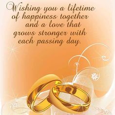 two gold wedding rings with the words wishing you a lifetime of happiness together and a love that grows younger with each passing day