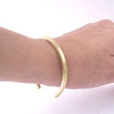 These Great Eye-Catchers are made of simple brass or Sterling silver and ideal for men and women. Here's what Our Customers have to say: "Beautiful bracelet very consistent with their photo and description! Thank you :)" "Fantastic cuff! I have ordered from VirginiaWynne more than any other shop. I end up wearing her classic pieces almost every day!" Perfectly capable of riding solo or a great piece to pile on with your other favorites. Made of 8 gauge solid square brass or sterling silver wire Classic Brass Bangle Bracelets, Classic Brass Bangle Cuff Bracelet, Classic Brass Cuff Bracelet As Gift, Brass Bangle Bracelet For Everyday Wear, Modern Brass Bangle For Everyday Wear, Handmade Minimalist Brass Bracelets, Handmade Minimalist Brass Bangle, Minimalist Handmade Brass Bangle, Minimalist Everyday Brass Bangle