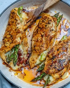 This asparagus stuffed chicken breast recipe is tender, juicy, and easy to make. Seasoned with garlic powder, paprika, and Italian seasoning mix Asparagus Stuffed Chicken, Asparagus Stuffed Chicken Breast, Fitness Meals, Stuffed Chicken Breast, Healthy Fitness Meals, Chicken Asparagus, Breast Recipe, Stuffed Chicken, Asparagus Recipe