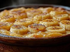 a close up of a plate of food with bananas