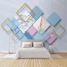 a bedroom with blue, pink and yellow squares on the wall