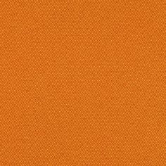 an orange fabric textured with small dots and lines, as well as the background