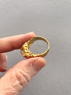 Super swanky PAIR of vintage 70's / 80's 18k / Kt heavy gold electroplate cubic zirconium / cz men's size 10 rings. One maintains the tag. Perfect for the gaudiest over the top wedding! In like new vintage condition. Size 10 Contact us with any questions, and please read our shop policies for full details. Vintage Gold Signet Ring With Rose Cut Diamonds, Vintage Gold Oval Crystal Ring, Vintage Gold Diamond Ring With Vvs Clarity, Gold Rings With Rose Cut Diamonds For Collectors, Vintage Yellow Gold Crystal Wedding Ring, Vintage Gold Dome Ring Hallmarked, Vintage Gold Signet Ring With Diamond Cut, Vintage Gold Dome Ring With Diamond, Vintage Gold Diamond Ring For Collectors