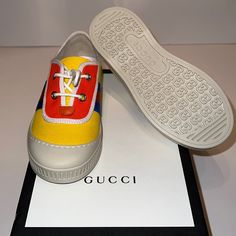 New With Tag/Box Size 28 Has A Small Stain On The Left Shoe But It Can Be Removed Gucci Yellow Sneakers For Streetwear, Yellow Gucci Sneakers For Streetwear, Gucci Yellow Streetwear Sneakers, Gucci Yellow Low-top Sneakers, Yellow Gucci Sneakers With Branded Insole, Gucci Yellow Sneakers With Round Toe, White Gucci Sneakers For Spring, Spring White Gucci Sneakers, Red High-top Gucci Sneakers